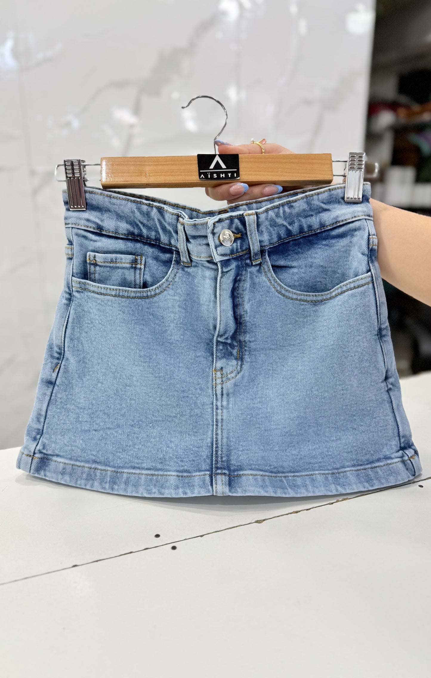 FALDA SHORT ISA/ TONO CELESTE